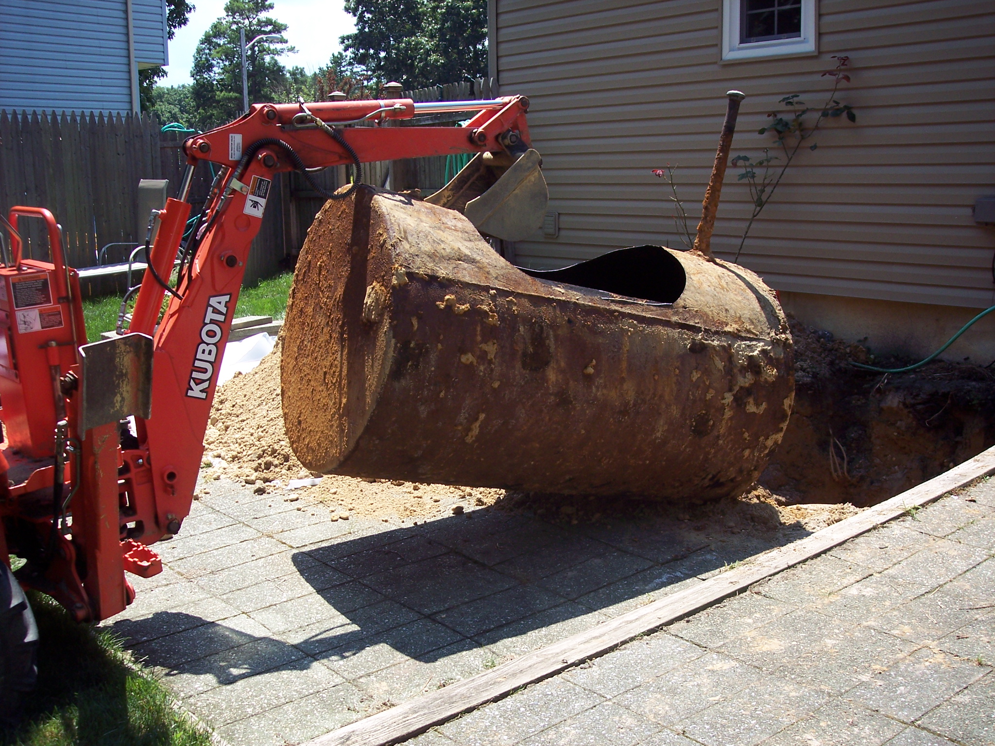 oil tank removal under patio
