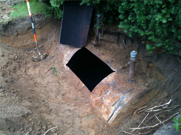 Oil tank cut open prior to entering and cleaning the tank