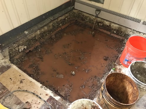 Basement oil tank leak remediation