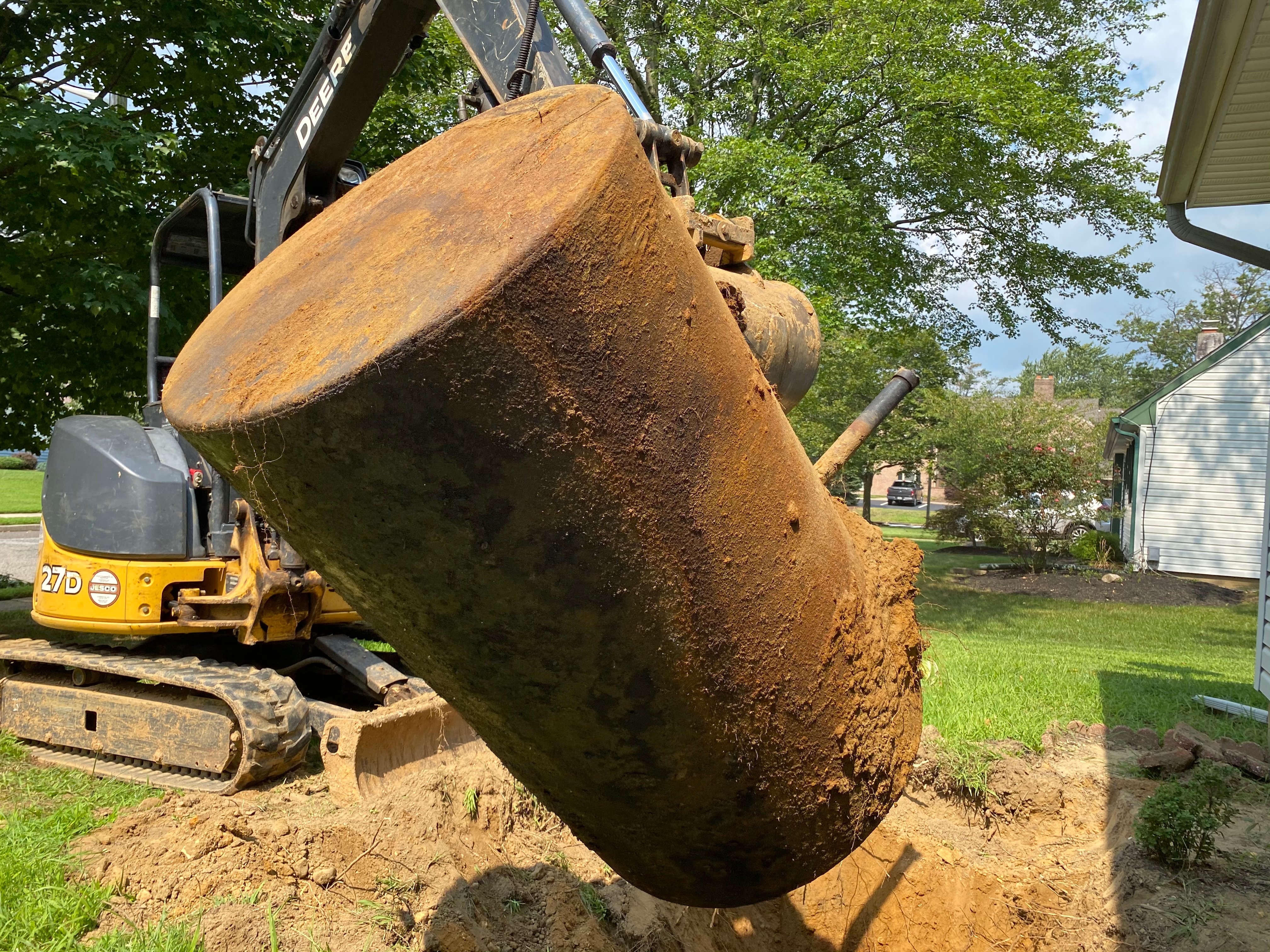 “The property I am buying has a buried oil tank that was decommissioned. The tank is filled with sand, gravel or foam and contains no oil. The seller has provided permits and reports from the town building inspector stating that the tank was properly abandoned and decommissioned. Is it necessary to remove the tank to determine whether contamination exists