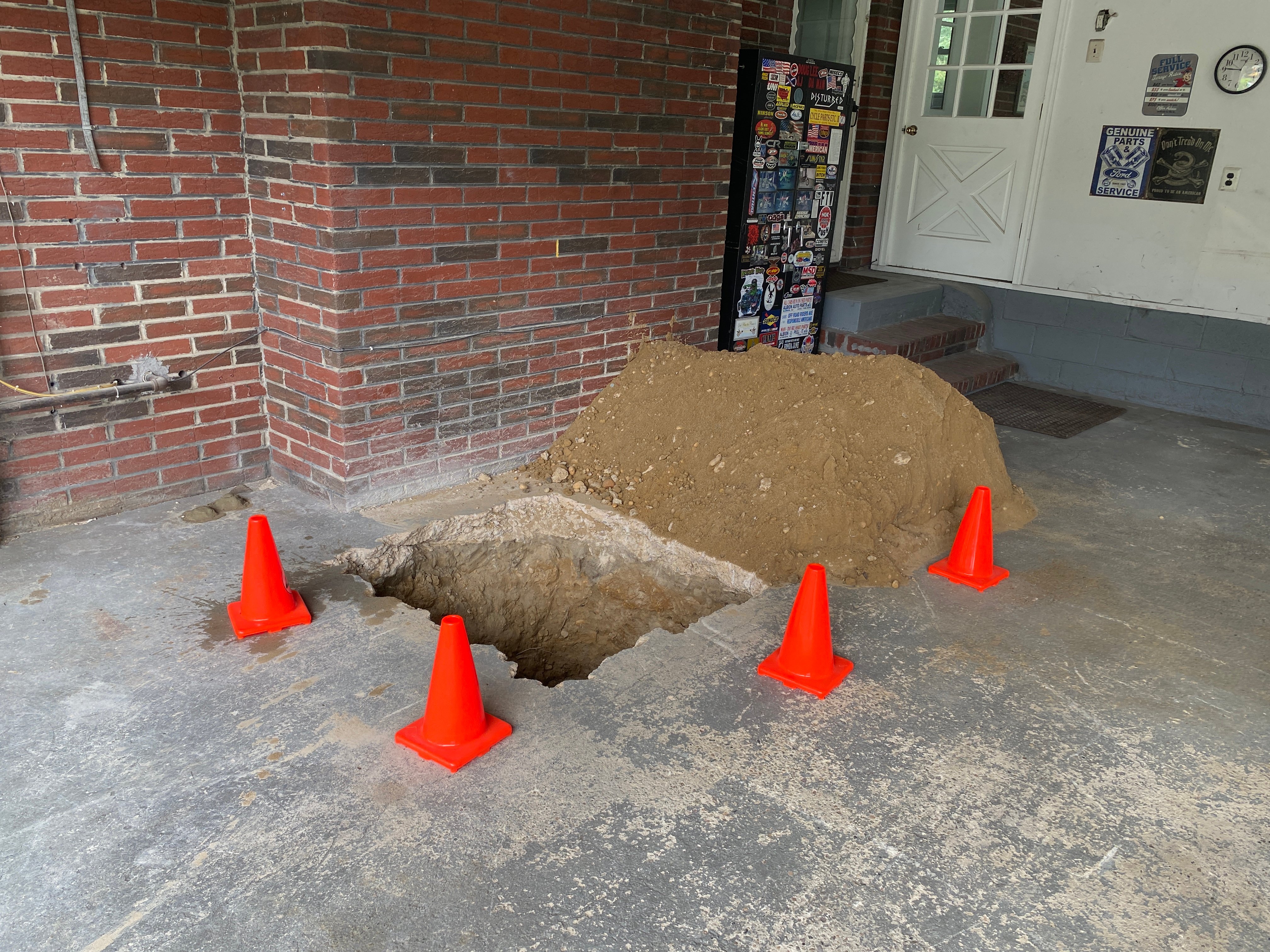 tank buried under garage floor
