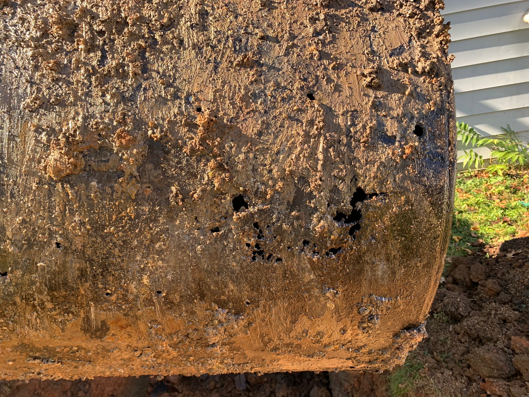 What do you do when an underground oil tank leaks?