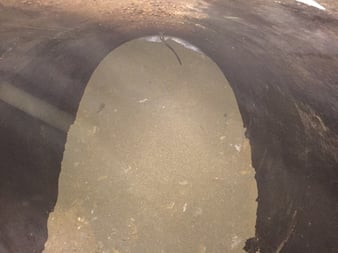 abandoning a tank with sand